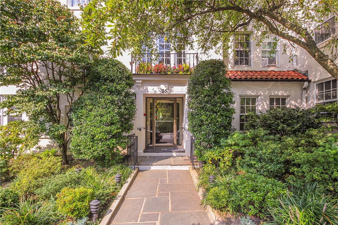 25 Sagamore Road, Unit 4H Bronxville, NY 10708 - Photo 1 of 1 a front view of a house with a garden
