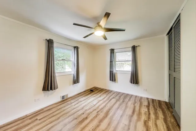 a view of an empty room and window