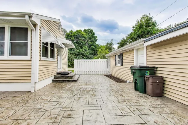 a view of a back yard of the house