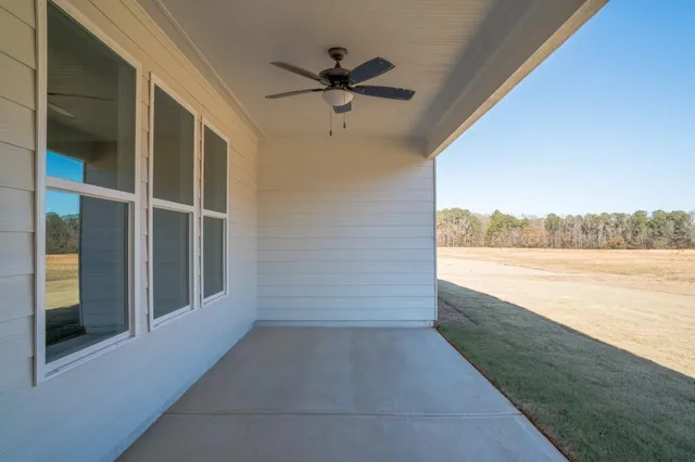 a picture of a bathroom with a shower