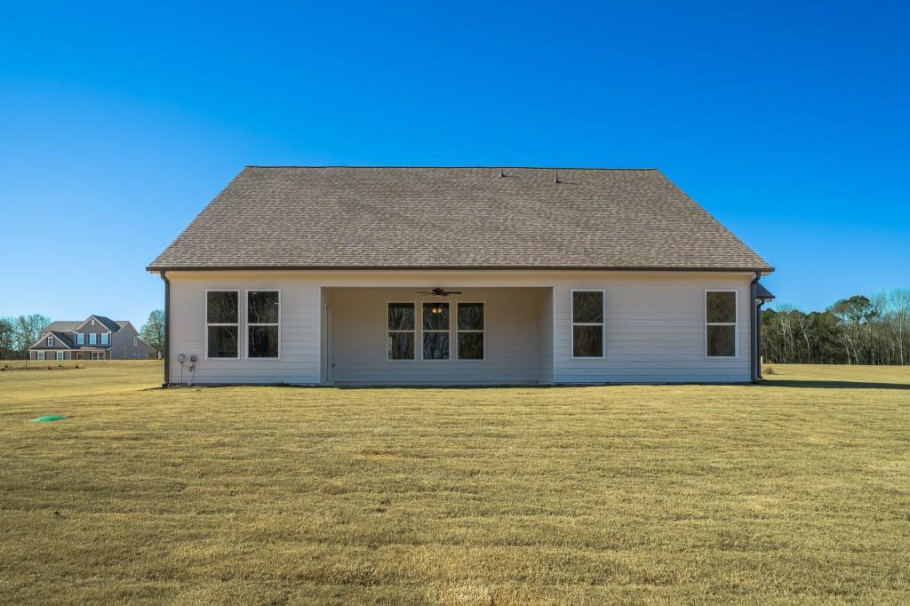 93 Tomahawk Trail Good Hope, GA 30641 - Photo 4 of 61 a house with swimming pool in front of it