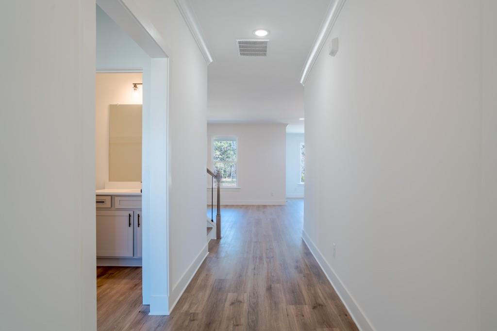 93 Tomahawk Trail Good Hope, GA 30641 - Photo 9 of 61 a view of hallway with wooden floor