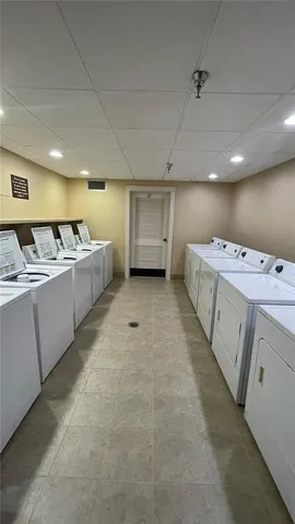 a utility room with washer and dryer