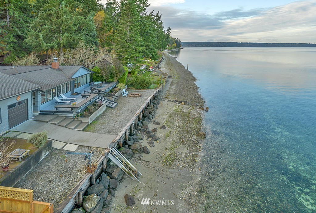 4336 Southwest Luana Beach Road Vashon, WA 98070 - Photo 27 of 40 a view of a house with a yard