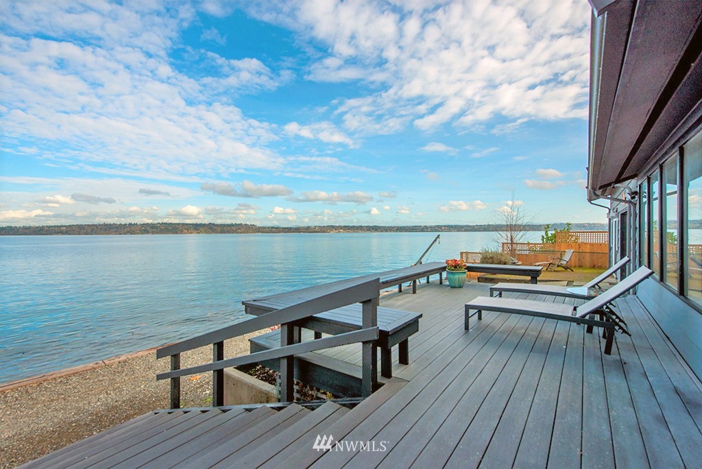 4336 Southwest Luana Beach Road Vashon, WA 98070 - Photo 30 of 40 a view of a terrace with wooden floor and outdoor seating