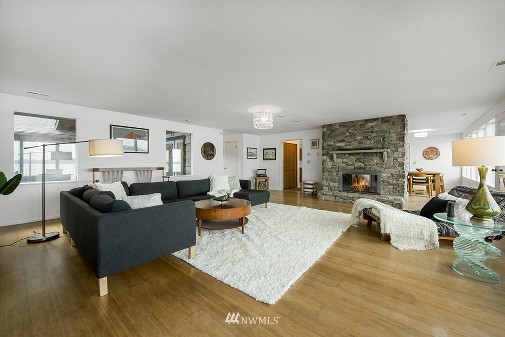 4336 Southwest Luana Beach Road Vashon, WA 98070 - Photo 6 of 40 a living room with furniture and a wooden floor