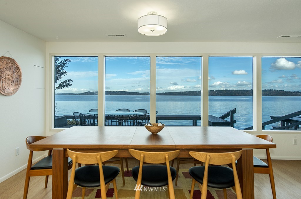 4336 Southwest Luana Beach Road Vashon, WA 98070 - Photo 7 of 40 a dining room with a table and chairs