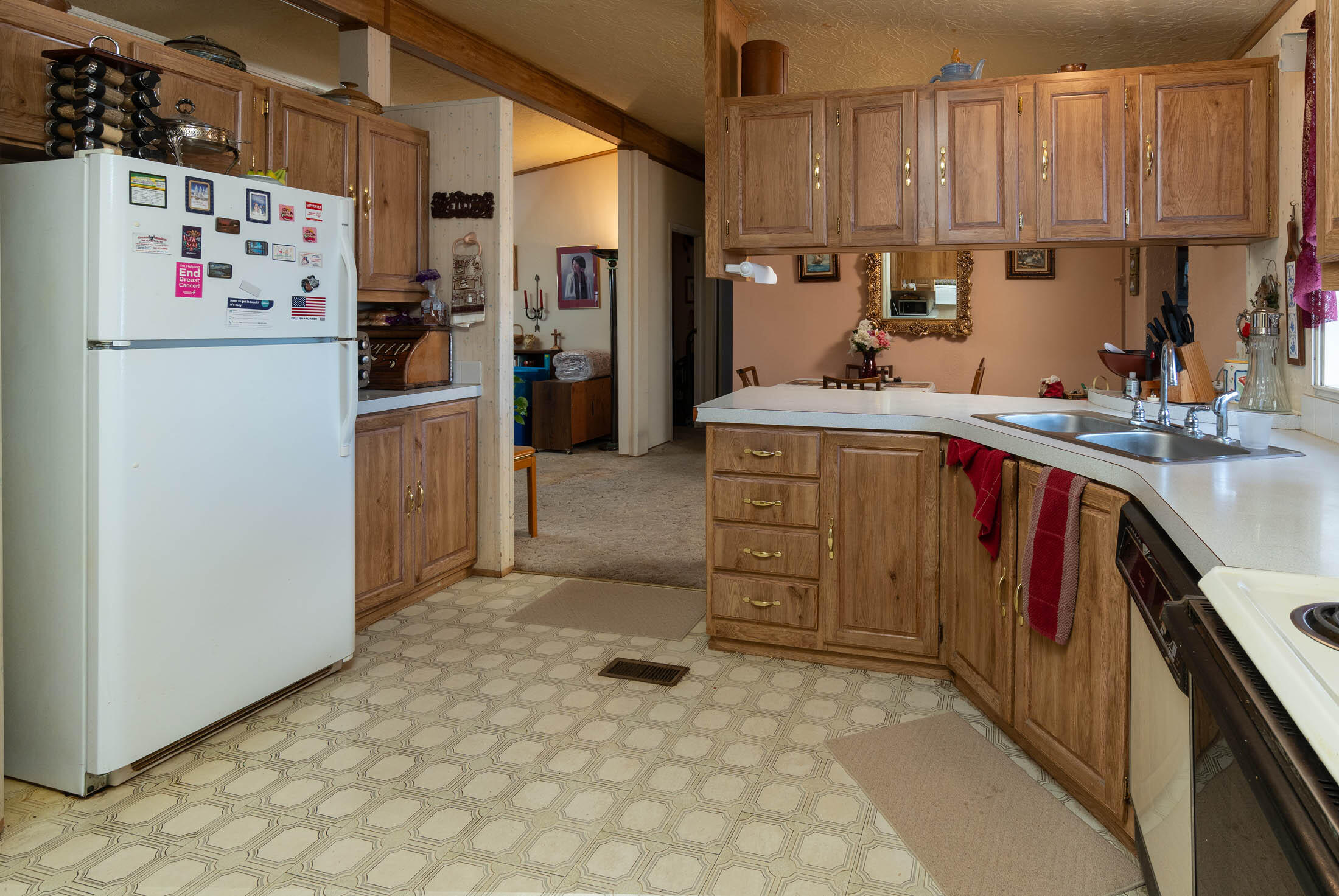 25907 South Cooper Street Bend, OR 97701 - Photo 10 of 34 a kitchen with refrigerator and cabinets