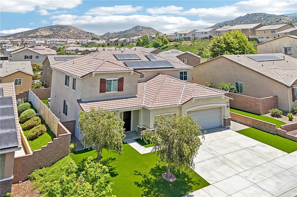 11056 Guffey Ranch Way Corona, CA 92883 - Photo 47 of 61 an aerial view of a house with a yard