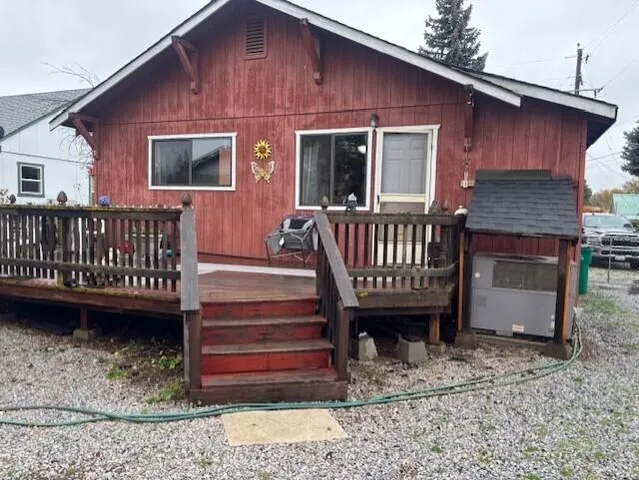 a house view with a backyard space