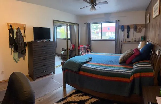 a bathroom with a sink a toilet and a bathtub