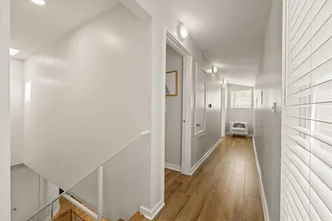 a bedroom with a bed and a flat screen television