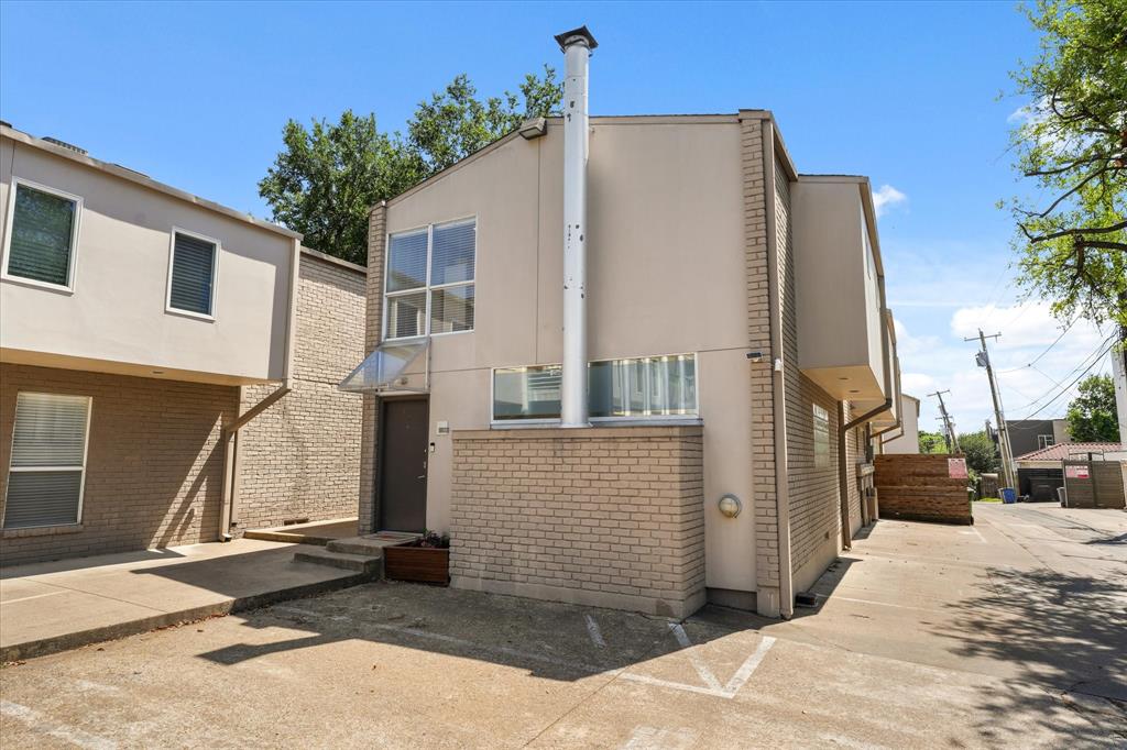 4231 Travis Street, Unit 29 Dallas, TX 75205 - Photo 37 of 39 a view of a street with house