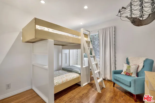 a view of a bathroom with a shower and a tub