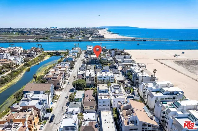 a view of a balcony with two chairs