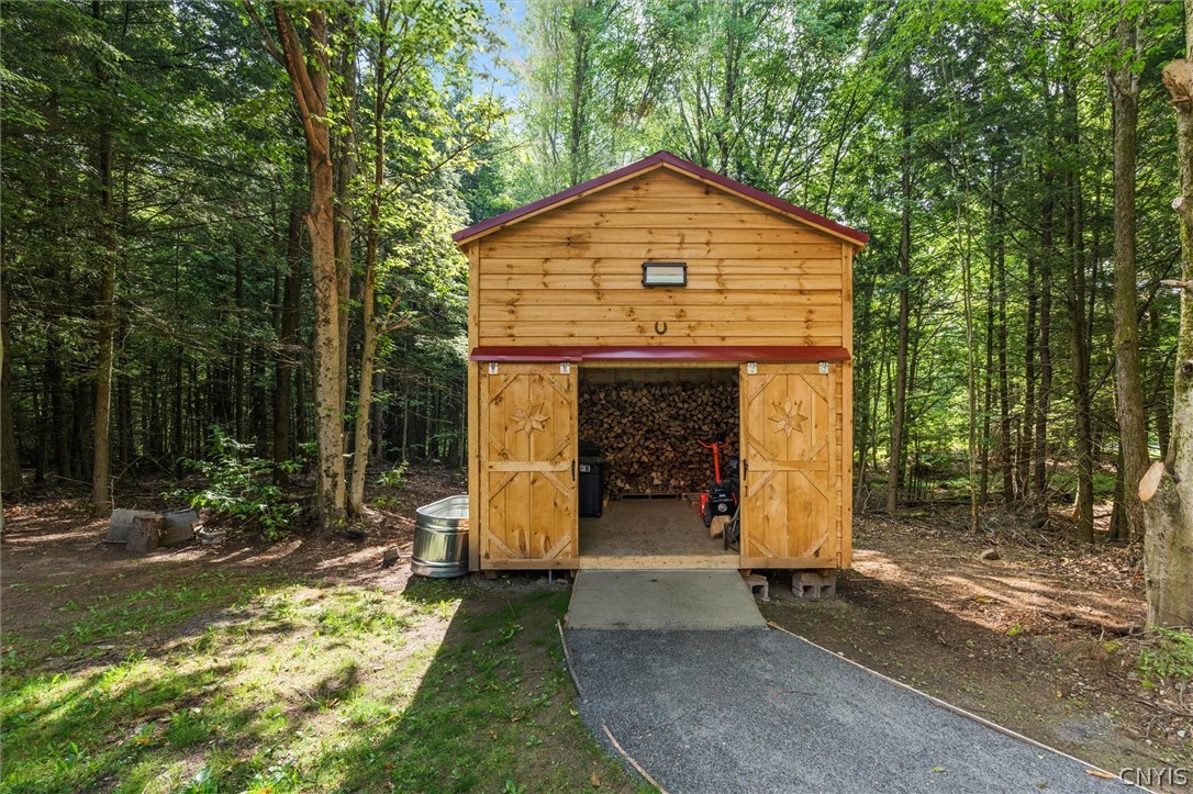 9831 Steam Mill Road Camden, NY 13316 - Photo 35 of 42 Brand-new 12 X 18 Amish-built barn. Space for equi