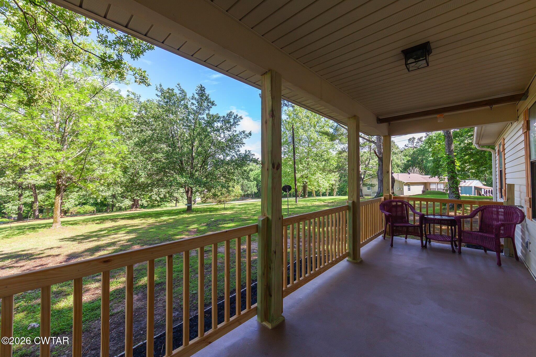 101 Wilde Road Pinson, TN 38366 - Photo 14 of 16 a view of a two chair in the balcony