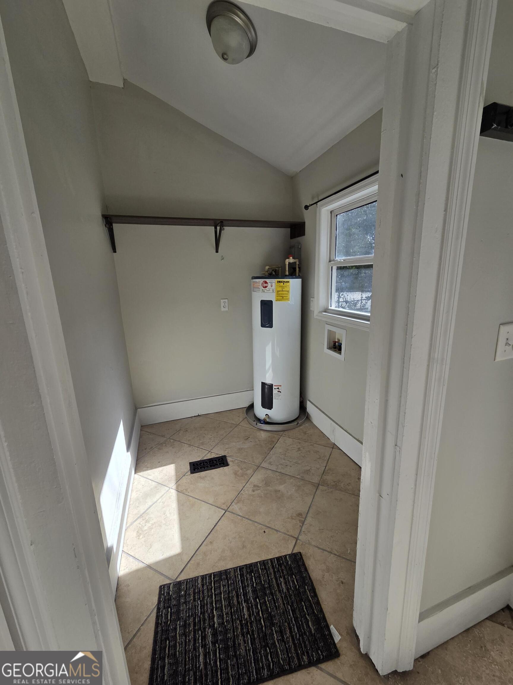 520 Ellis Street Brunswick, GA 31520 - Photo 17 of 48 a bathroom with a sink and a shower