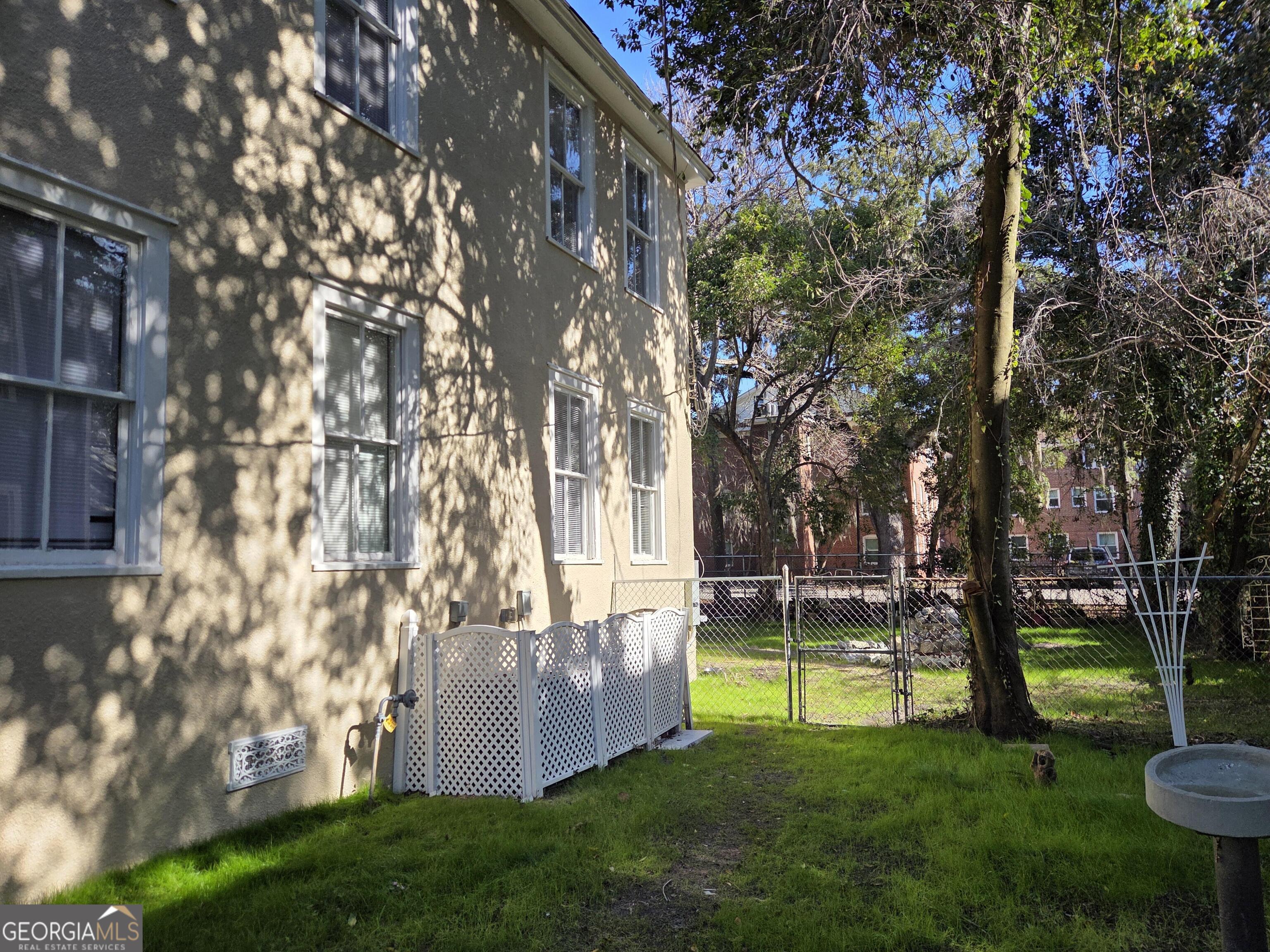 520 Ellis Street Brunswick, GA 31520 - Photo 3 of 48 a view of a park with large trees