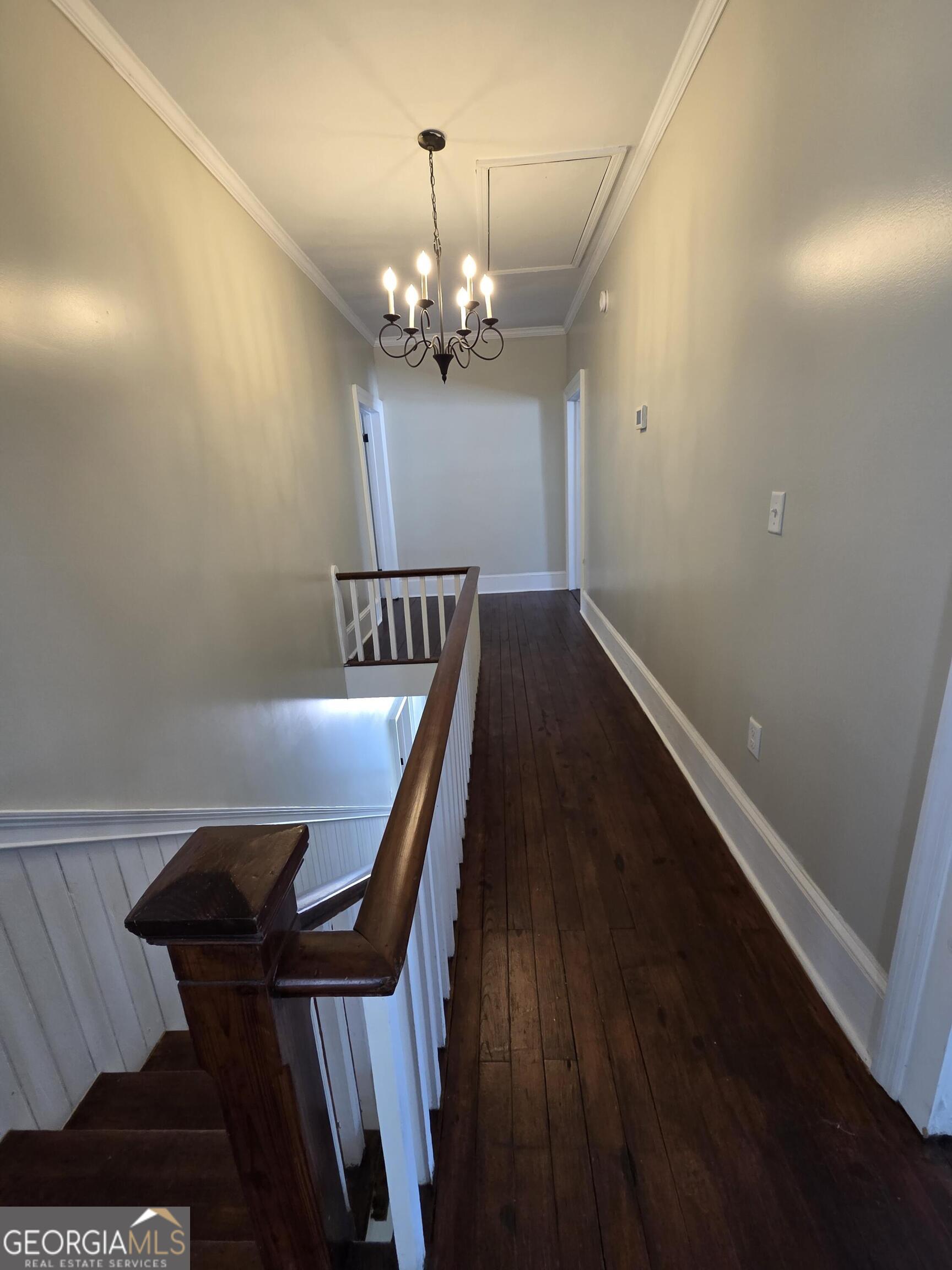 520 Ellis Street Brunswick, GA 31520 - Photo 38 of 48 a view of a dining room with furniture and chandelier