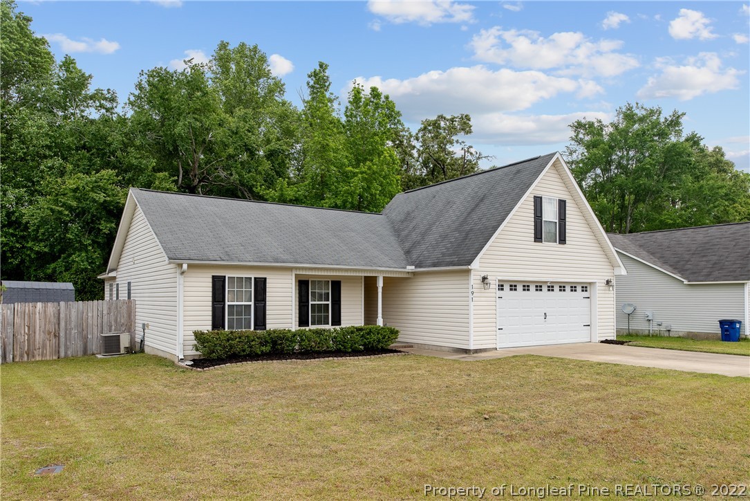 191 Quarry Lane Raeford, NC 28376 - Photo 2 of 42 a view of a house with a outdoor space