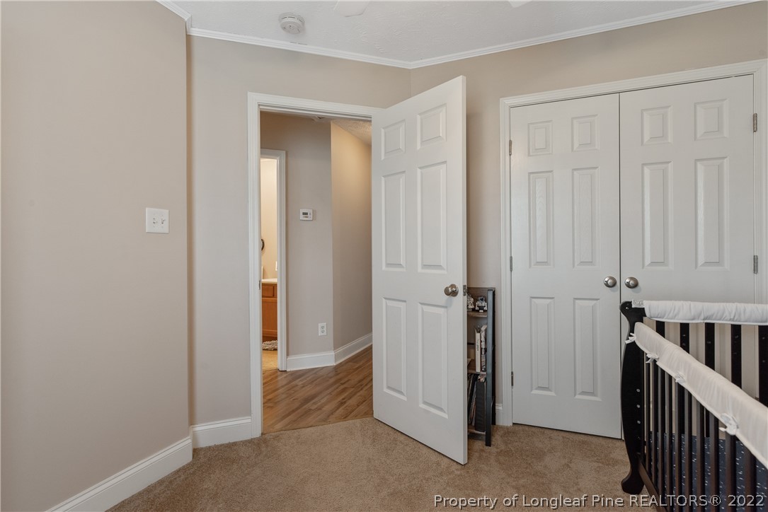 191 Quarry Lane Raeford, NC 28376 - Photo 31 of 42 a view of a hallway with closet area