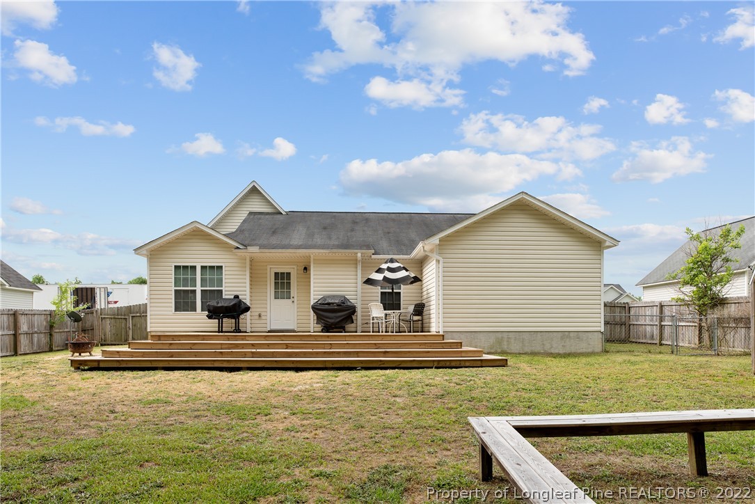 191 Quarry Lane Raeford, NC 28376 - Photo 38 of 42 a front view of a house with garden