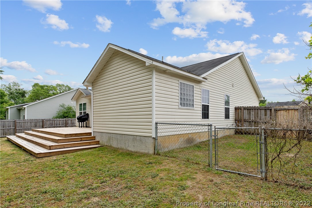 191 Quarry Lane Raeford, NC 28376 - Photo 40 of 42 a view of a backyard