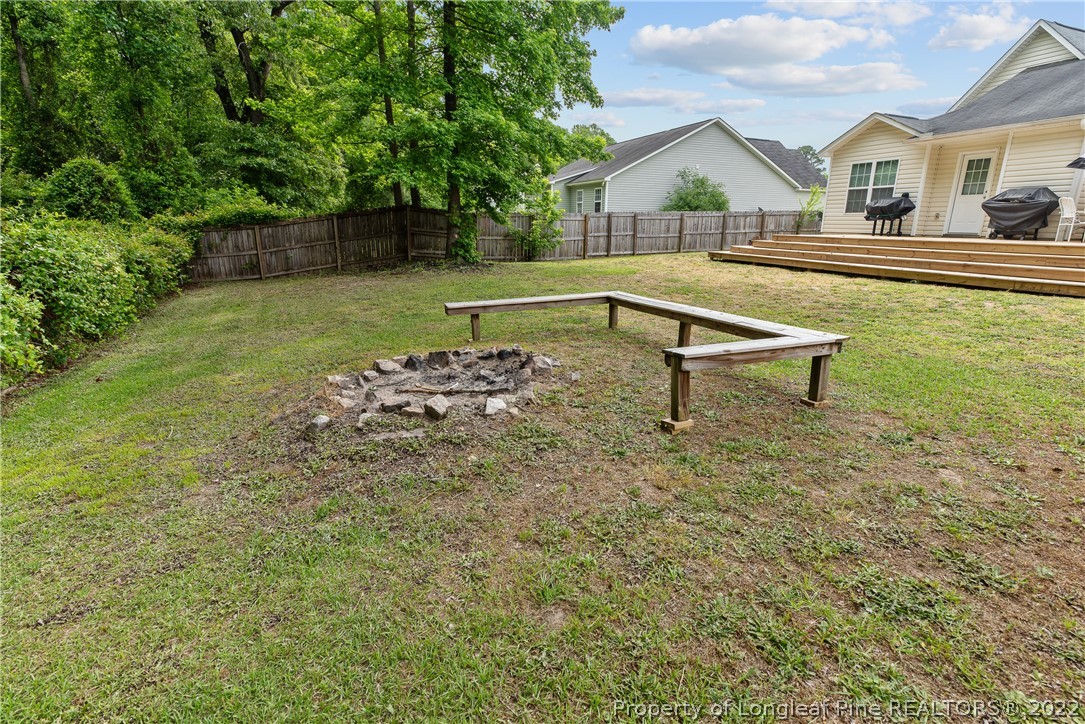 191 Quarry Lane Raeford, NC 28376 - Photo 41 of 42 a view of a house with a yard and sitting area