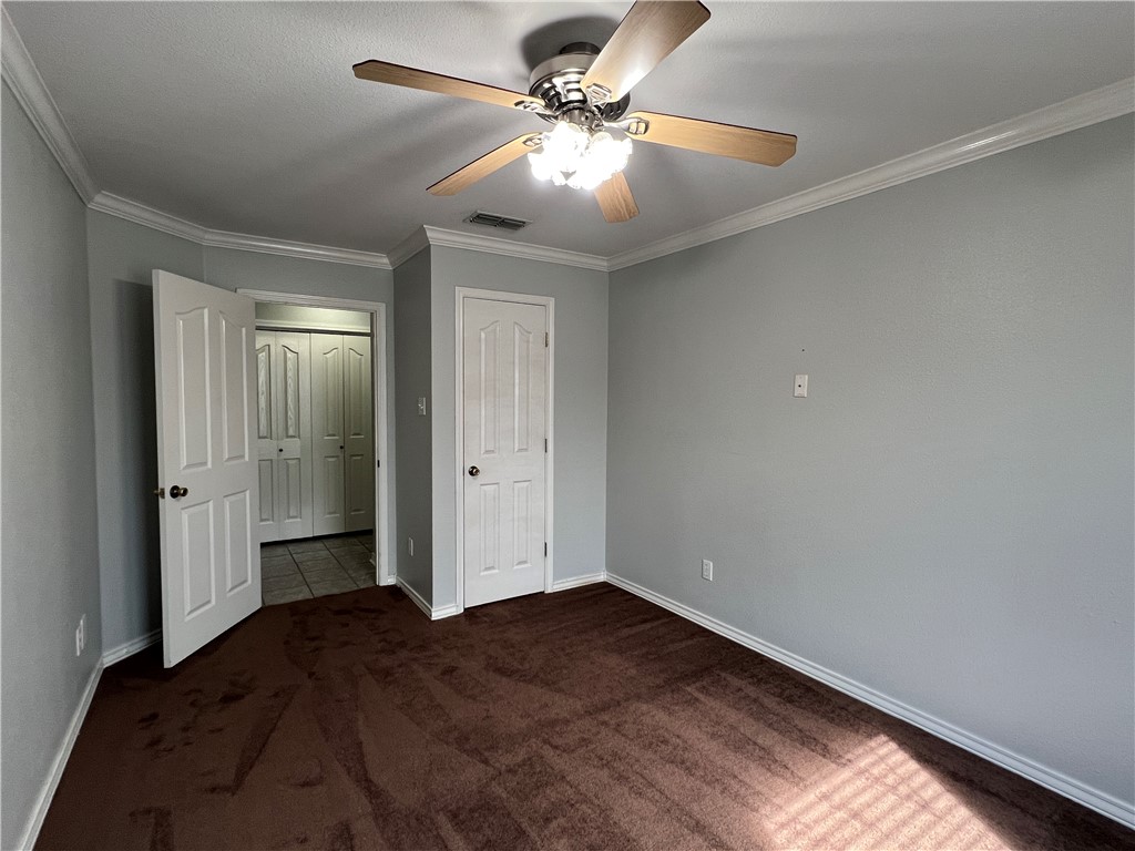 5026 Yorktown Boulevard, Unit 23 Corpus Christi, TX 78413 - Photo 14 of 29 a view of empty room with wooden floor