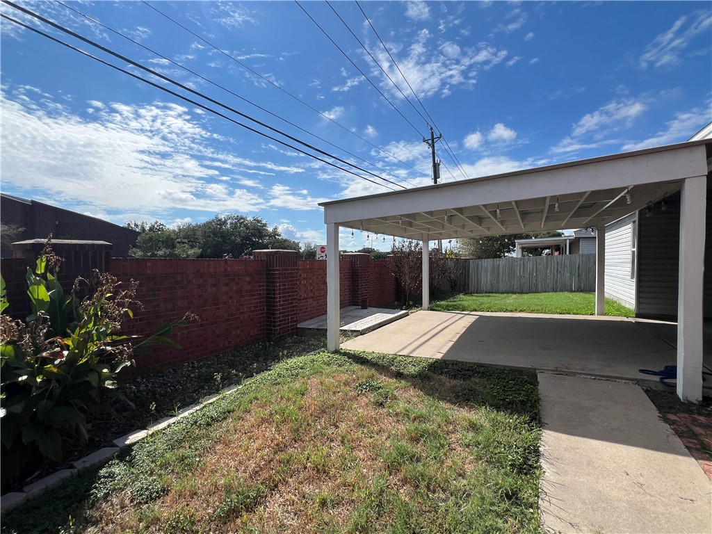 5026 Yorktown Boulevard, Unit 23 Corpus Christi, TX 78413 - Photo 25 of 29 a view of a backyard