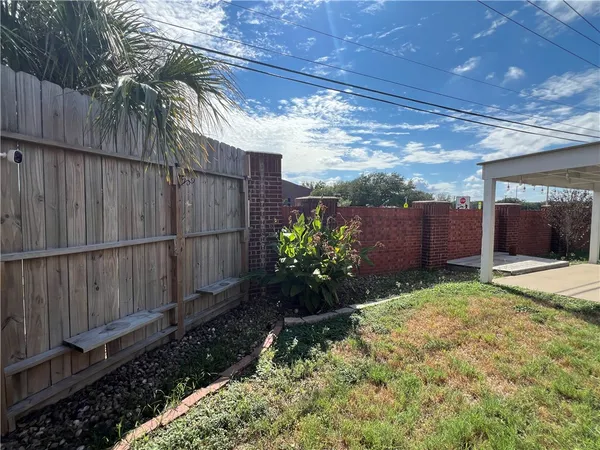 a house view with a garden space