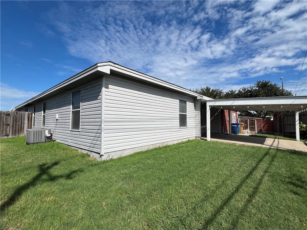 5026 Yorktown Boulevard, Unit 23 Corpus Christi, TX 78413 - Photo 27 of 29 a front view of a house with garden