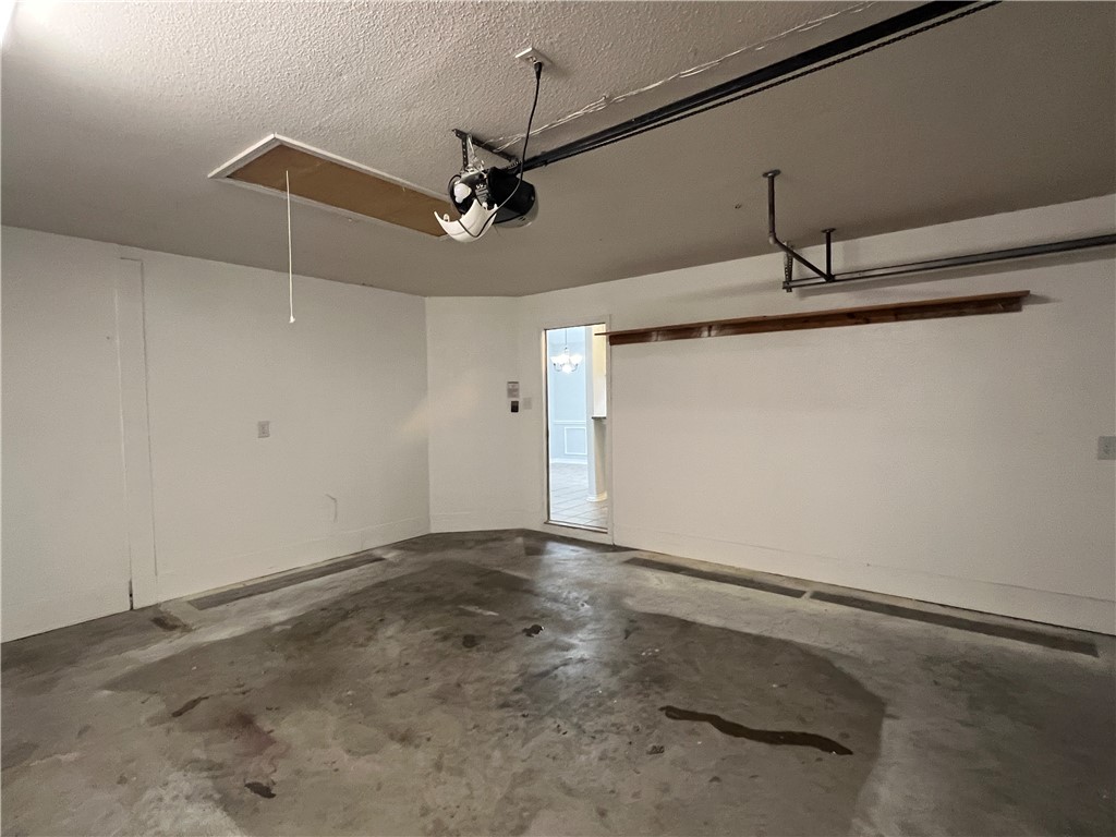 5026 Yorktown Boulevard, Unit 23 Corpus Christi, TX 78413 - Photo 29 of 29 a view of a room with an empty space