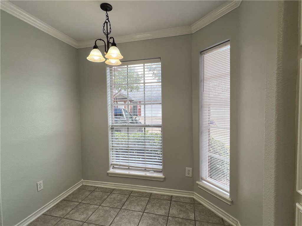 5026 Yorktown Boulevard, Unit 23 Corpus Christi, TX 78413 - Photo 7 of 29 a view of an empty room with a window