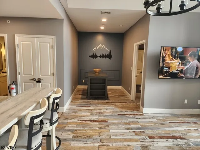 a view of a livingroom with furniture and a couch