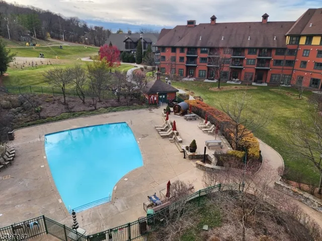 a view of a swimming pool and outdoor space