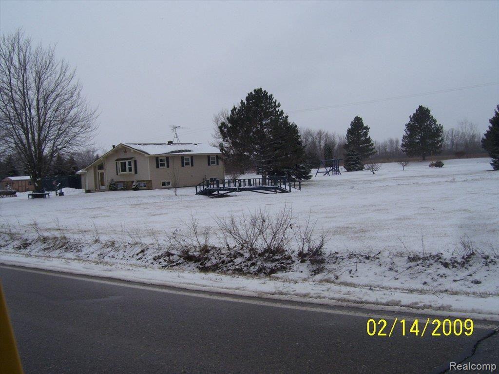 445 Riley Center Road Memphis, MI 48041 - Photo 2 of 15 side