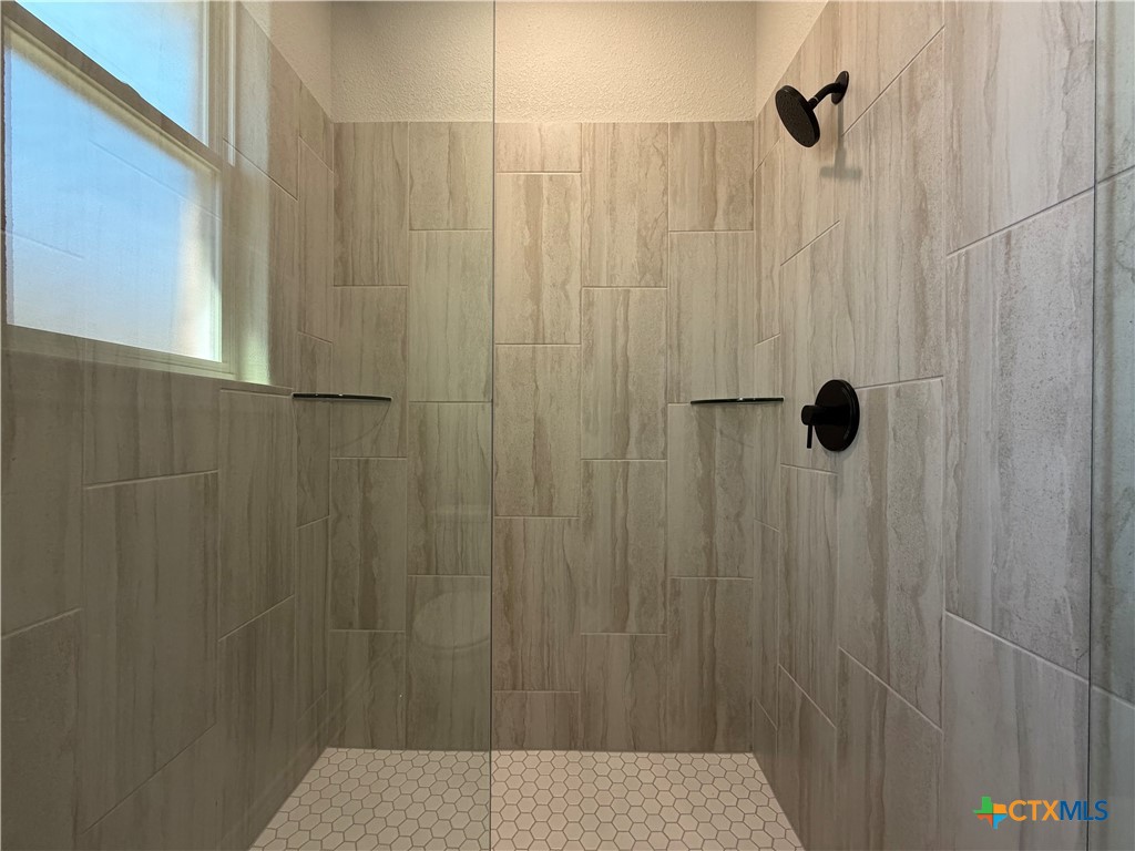 3008 Seeker Street Killeen, TX 76549 - Photo 15 of 25 a bathroom with a shower