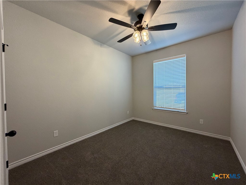 3008 Seeker Street Killeen, TX 76549 - Photo 21 of 25 an empty room with a window
