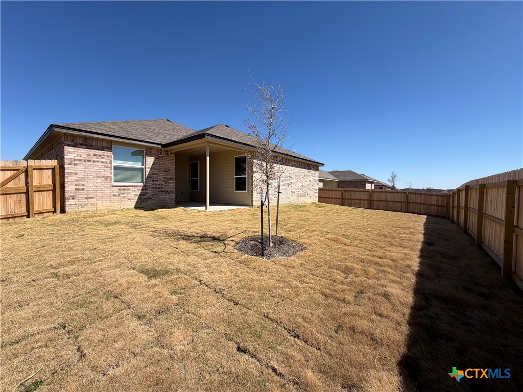 3008 Seeker Street Killeen, TX 76549 - Photo 24 of 25 a front view of a house with a yard