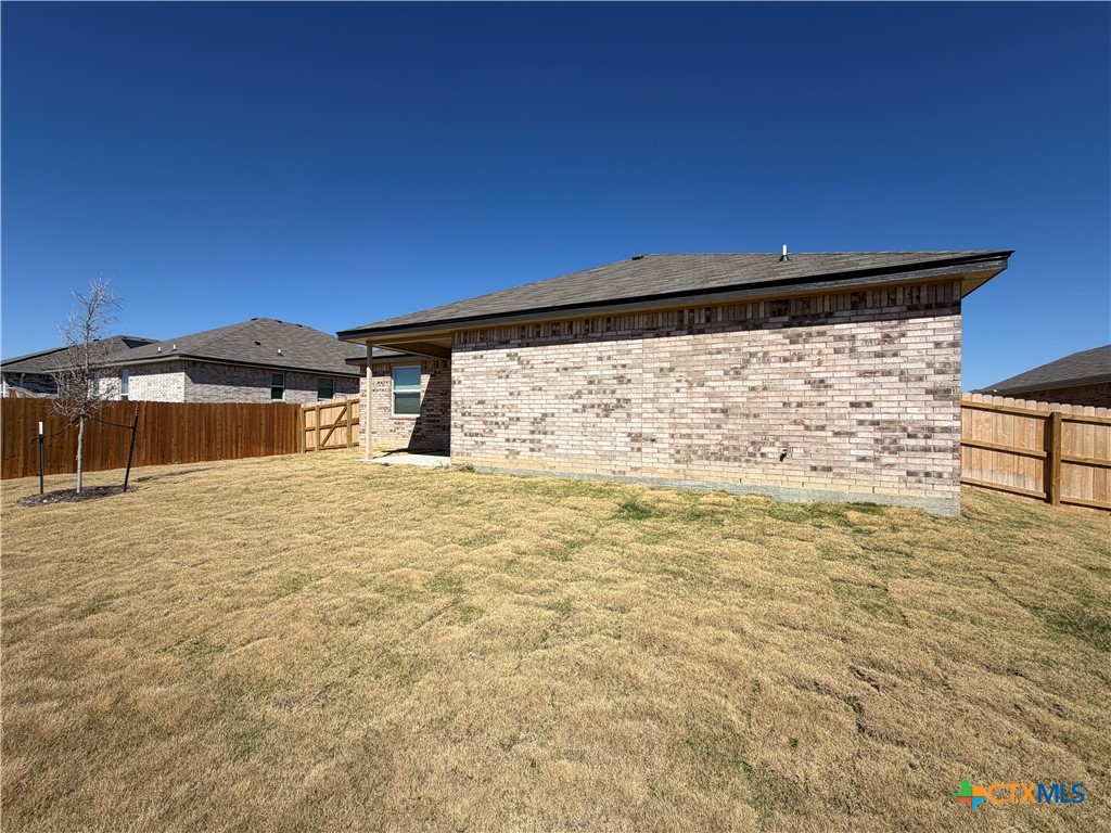 3008 Seeker Street Killeen, TX 76549 - Photo 25 of 25 a view of empty room with wooden floor and fan