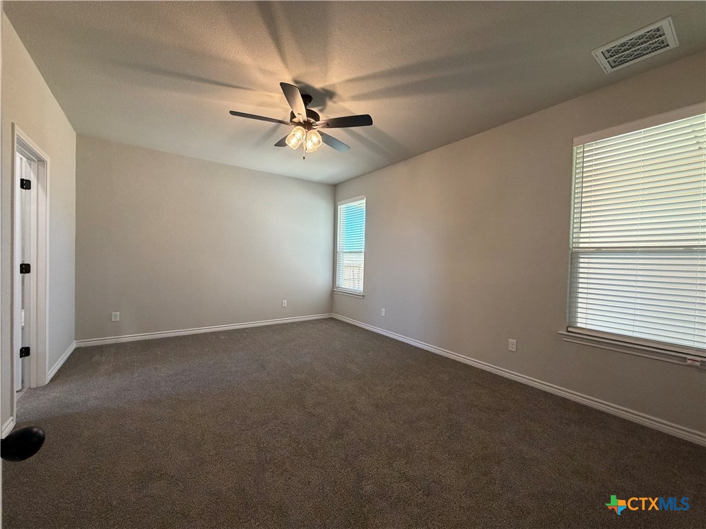 3008 Seeker Street Killeen, TX 76549 - Photo 10 of 25 a view of room with a ceiling fan and window