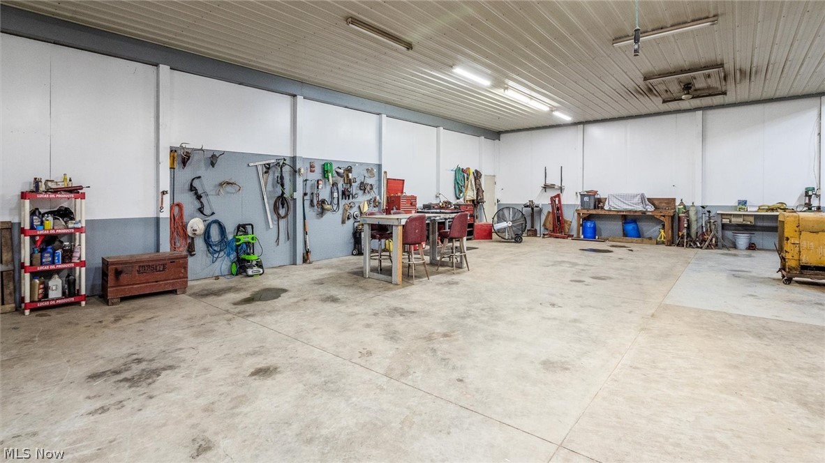 9393 Pioneer Road Byesville, OH 43723 - Photo 24 of 35 Garage featuring a workshop area