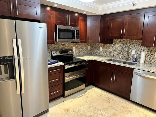 a view of a living room and dining room