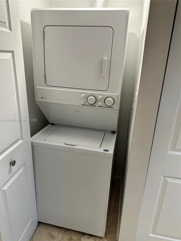 an aerial view of a house with outdoor space