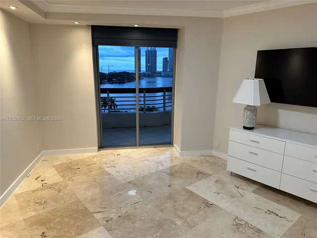 a white toilet and shower