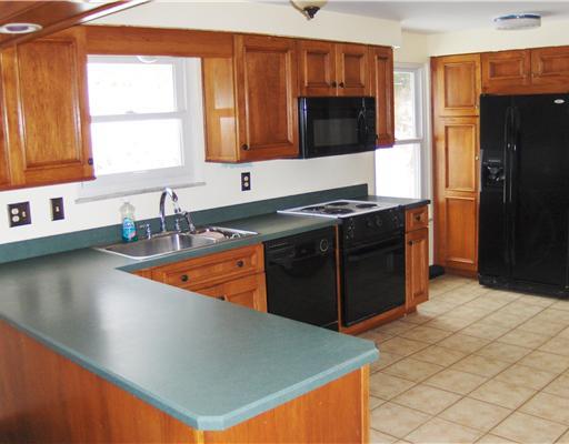 427 Strope Road Burgettstown, PA 15021 - Photo 5 of 18 Kitchen. Updated kitchen with black walnut cabinets and ceramic tile floor.