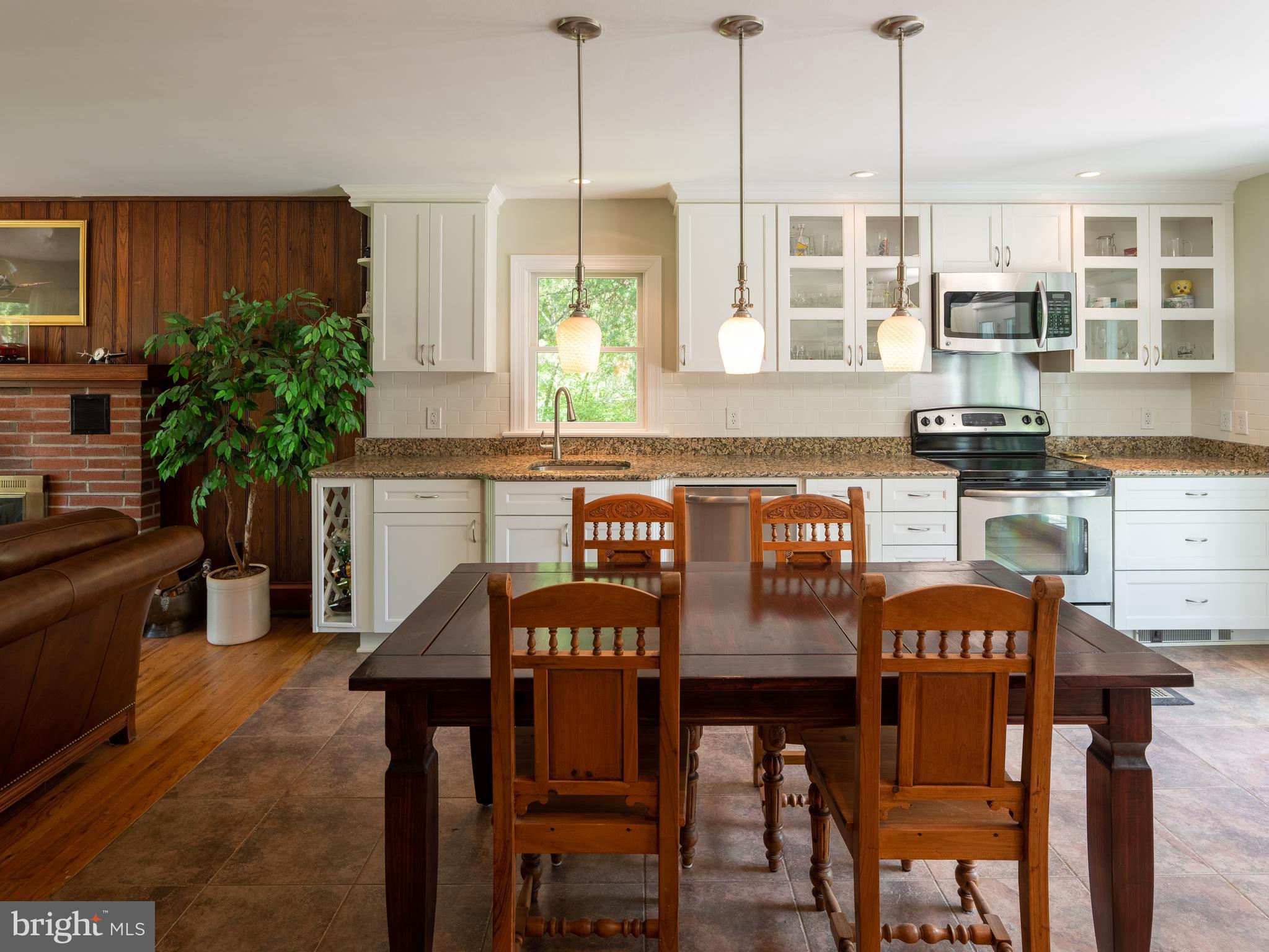 6616 Ferry Road New Hope, PA 18938 - Photo 9 of 49 Eating by the fire, radiant heated kitchen tiles