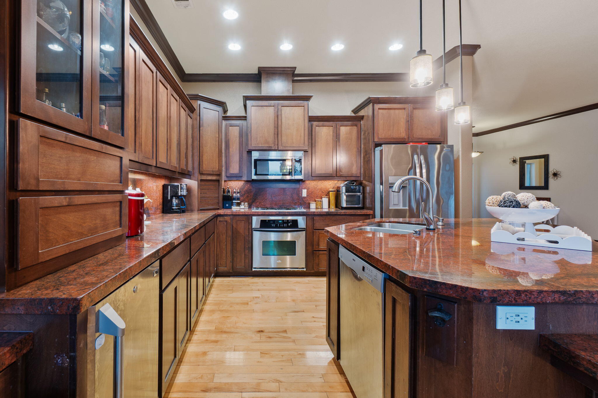 3360 Stanford Drive Redding, CA 96003 - Photo 16 of 56 a kitchen with stainless steel appliances granite countertop a sink refrigerator and cabinets